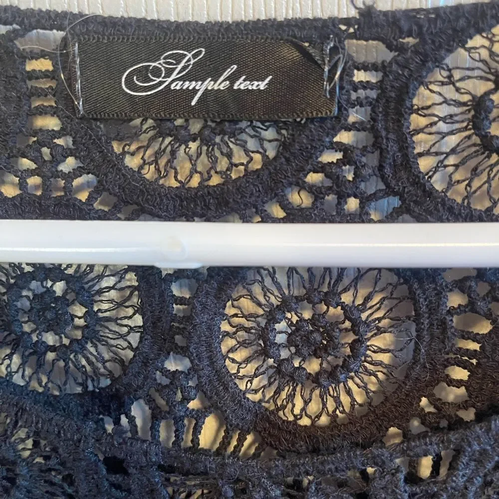 Sample text black crochet cropped top